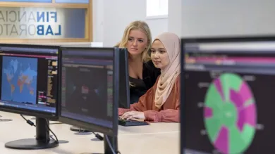 Two students at work in the financial laboratory