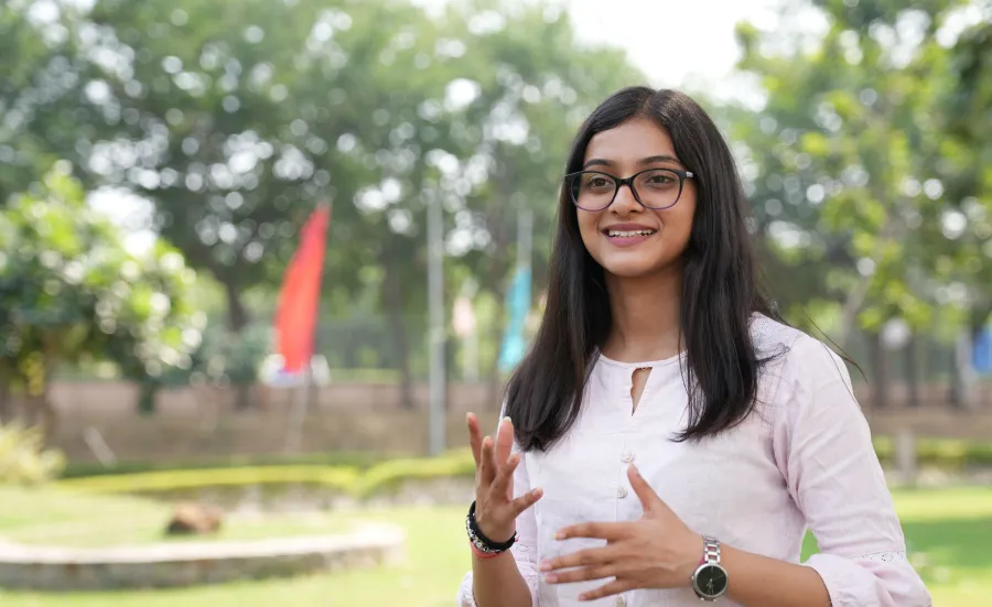 Saumya standing outside