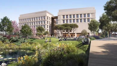 A CGI development mockup of the proposed North East Quadrant building, surrounded by trees, a small wildflower garden and wildlife pond with students resting and studying