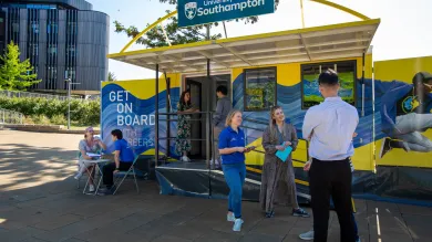 Careers staff talking with students at a University of Southampton outdoor stand.