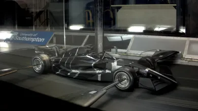 Formula 1 race car model undergoing aerodynamic testing in the University of Southampton wind tunnel