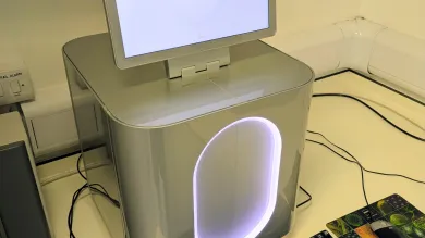 Illumina MiSeq i100 Plus DNA sequencing platform with integrated touchscreen in a laboratory setting.