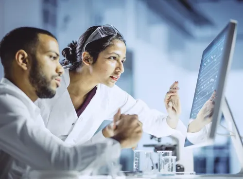 Image showing two doctors looking at a computer screen.