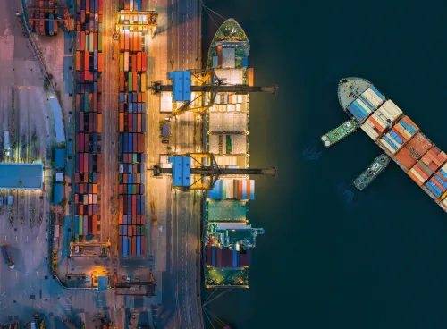 iStock aerial view of a commercial container ship in a dockyard