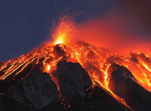 lava flowing down an erupting volcano