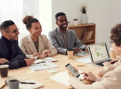 People sitting around a table and talking