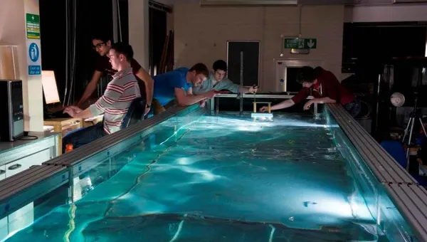 Researchers using a large scale wave tank