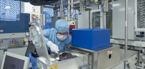 Researcher in a cleanroom