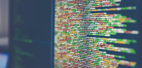 Java coding in different colours on an angled computer screen