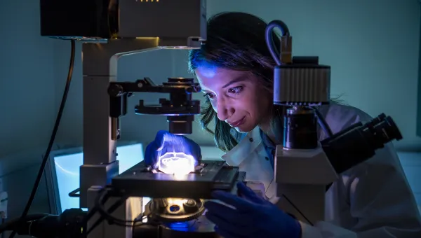 A woman working in a laboratory.