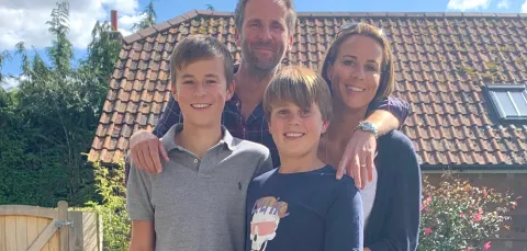 Clinical trial patient Crispin Malpas with his wife, Claudia, and two sons.