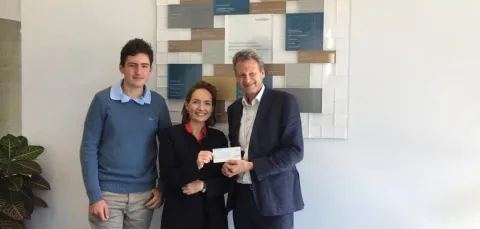 Donor Liza Butterworth hand-delivering her donation to the centre