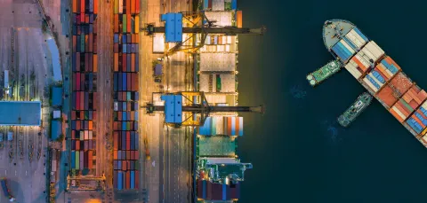 iStock aerial view of a commercial container ship in a dockyard