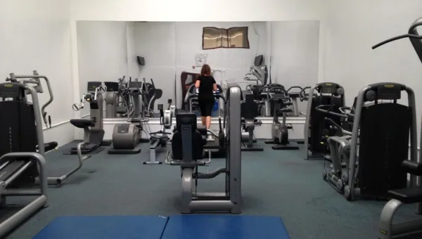 Girl on treadmill in gym
