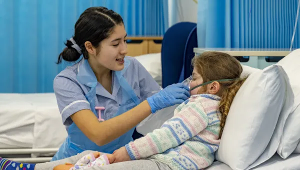 student nurse with patient