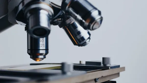 Microscope lens positioned above a slide