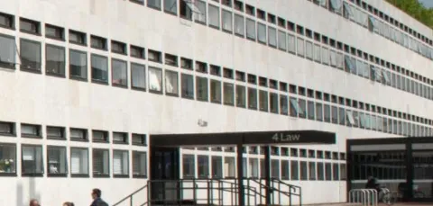 Exterior view of building 4 on Highfield Campus, a long low concrete building