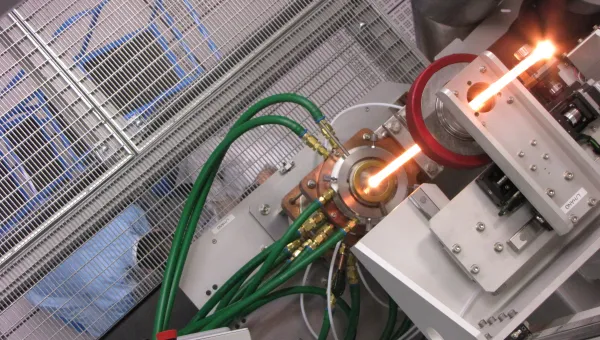 Preform in furnace on tower 