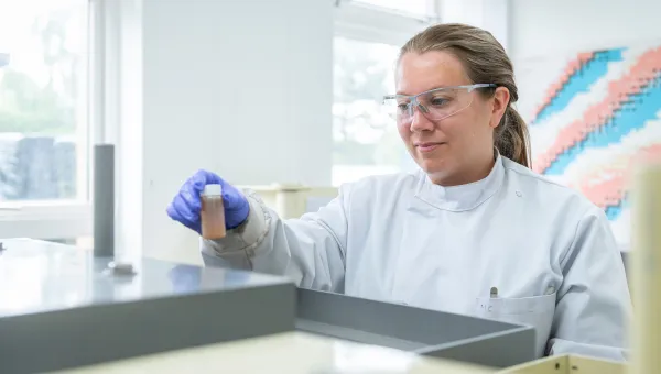 Scientist working with lab equipment