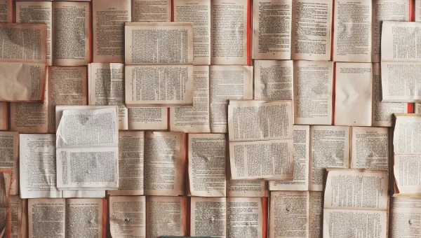 Rows of open books in overhead photo
