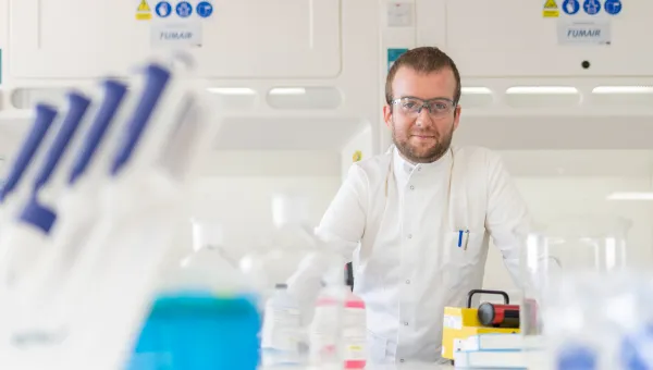Scientist working with lab equipment