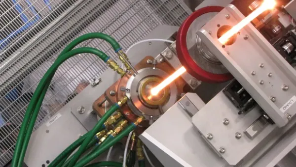 Preform in furnace on tower