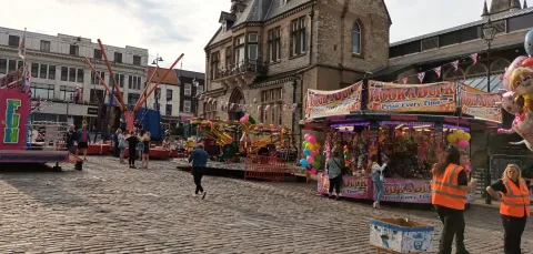 Wide shot of a market in a town centre