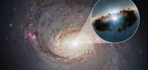 A satellite image of a galaxy, with a box zooming in on the centre and revealing a supermassive black hole hidden behind a cloud of gas and dust.