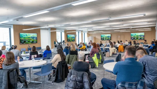 Group watching a presentation for an event
