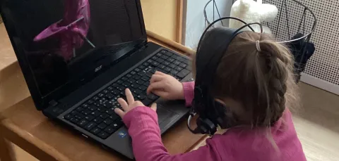 Early Years Centre child using laptop