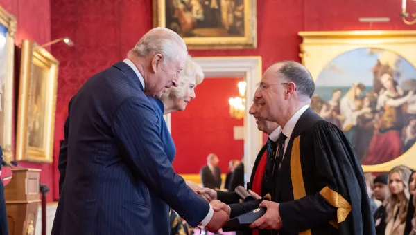 King and Queen present royal prize to Southampton rail researchers at Windsor Castle.