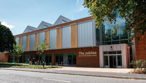 The outside view of the Jubilee Sports Centre on a sunny day.