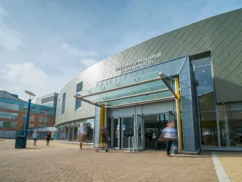 People coming and going outside the entrance of Southampton General Hospital.