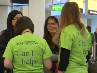 International students being welcomed by Southampton staff at the airport.