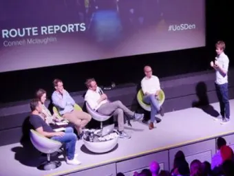 A student entrepreneur presents his business idea, Route Reports, to a panel of investors at the University's FutureWorlds Dragon's Den event.