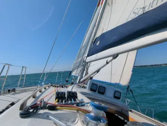 Looking out over the bow of a yacht at sea