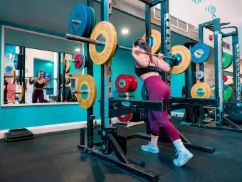 Athlete lifting weights in the gym
