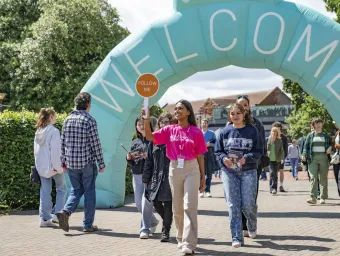 Guide taking students on a tour of the campus