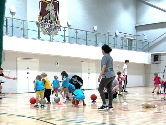 Children playing in a sports room