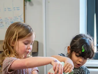 Early Years Centre children playing with sand