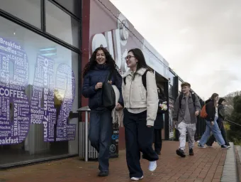 Students walking outside SUSU on Highfield campus.