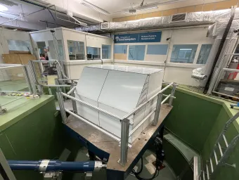 6-axis motion simulator with a cabin on shown from the front