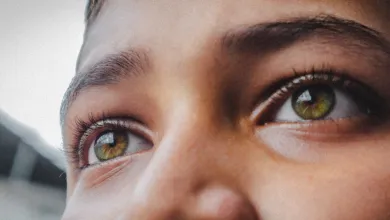 Close up of a young person's eyes looking into the distance
