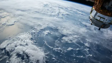 View of Earth from space as a satellite passes out of shot