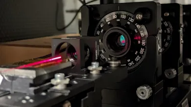 Light trapped in and guided along the air filled core of a hollow-core fiber by thin, glass-based, hollow cylinders that act like the bars of a cage.