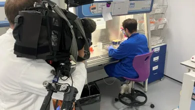 Filming a technician working in a fume cupboard