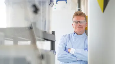 NOC consultant Andrew Cundy standing in a lab.