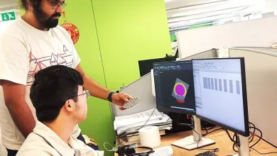 Two men near computer