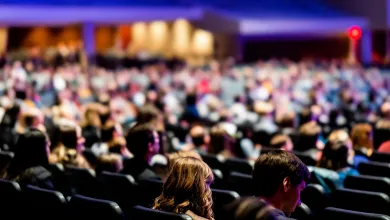 Audience Sitting in Chairs