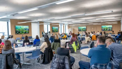 Group watching a presentation for an event